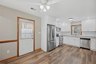 Kitchen with side door. | Image 3