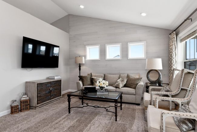 (Photo of decorated model, actual home's finishes will vary) The great room is cozy and contemporary. | Image 11
