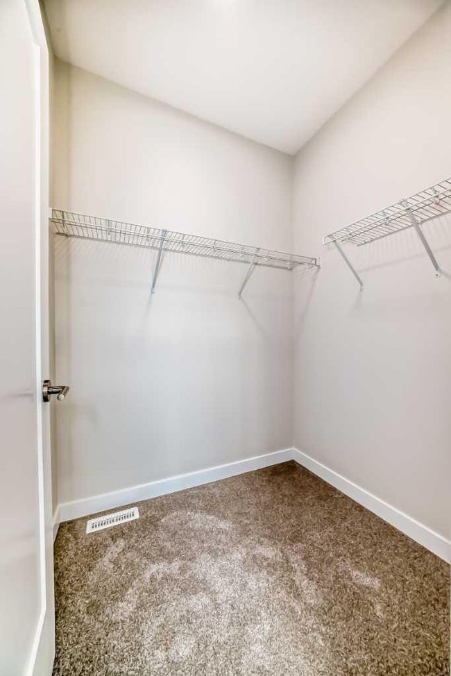 214 Shawnee Square Sw, Townhouse with 2 bedrooms, 3 bathrooms and 3 parking in Calgary AB | Image 39