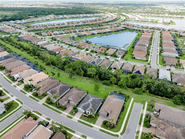11560 Tapestry Ln, House other with 3 bedrooms, 3 bathrooms and null parking in Venice FL | Image 57