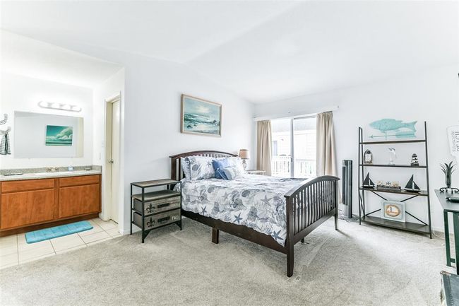 Large bedroom with a huge walk-in closet. | Image 13