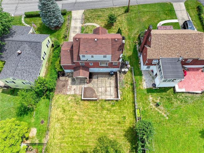 Drone shot of rare flat backyard. | Image 24