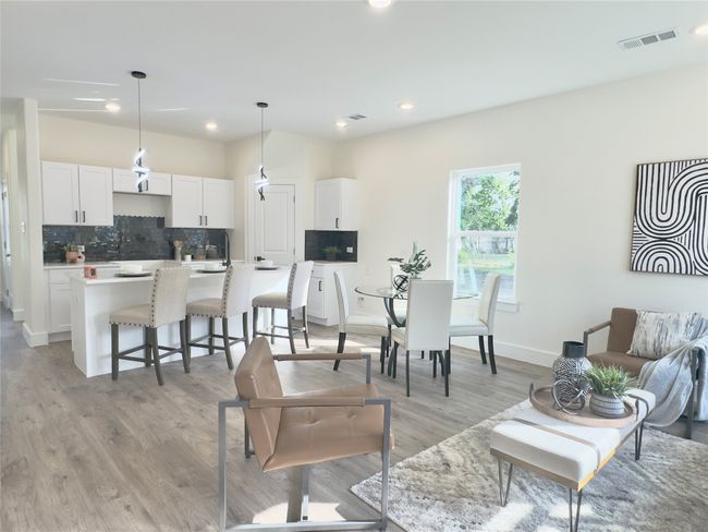 Living room with recessed lighting, visible vents, light wood-style flooring, and baseboards | Image 4