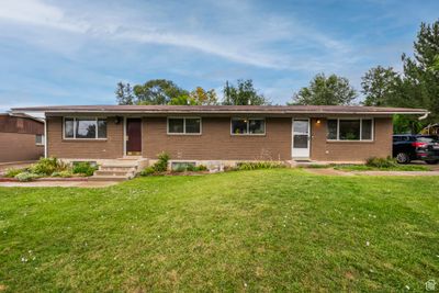 Single story home featuring a front lawn | Image 2