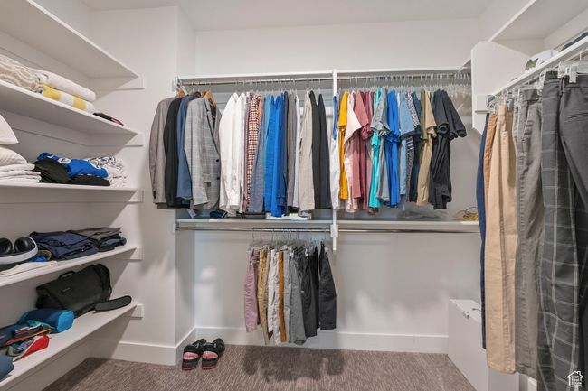 Spacious closet with carpet floors | Image 18