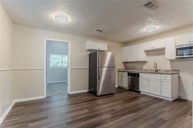 2212 Chestnut Log Loop, House other with 4 bedrooms, 2 bathrooms and 2 parking in Lithia Springs GA | Image 5