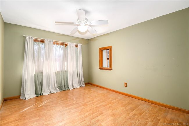 A second bedroom offers a glimpse of those one-of-a-kind views and endless woods. | Image 31