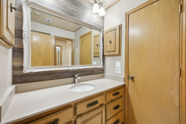 Primary Bath Features Separate Vanity Sinks and Medicine Cabinets | Image 24