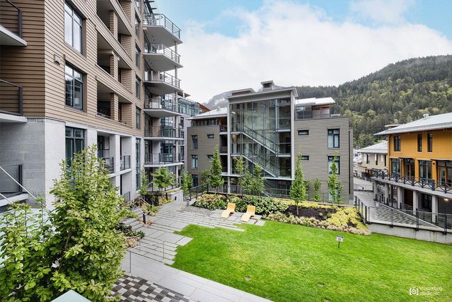 Surrounding community with a yard | Image 25