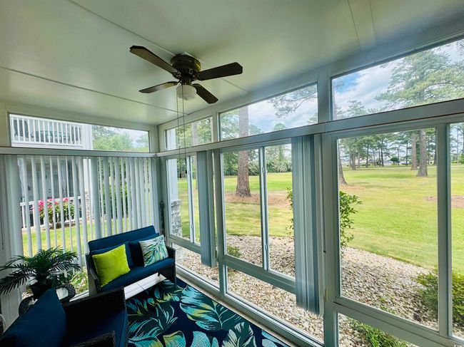 Sunroom with ceiling fan and healthy amount of natural light | Image 10