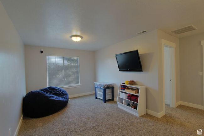 Living area featuring carpet floors | Image 10