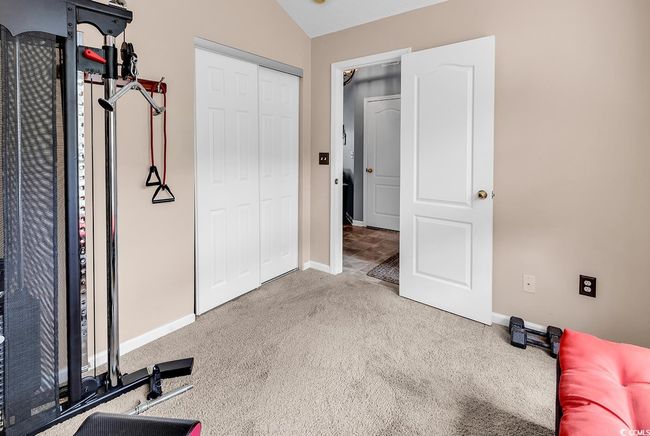 carpet, a closet, and vaulted ceiling | Image 6