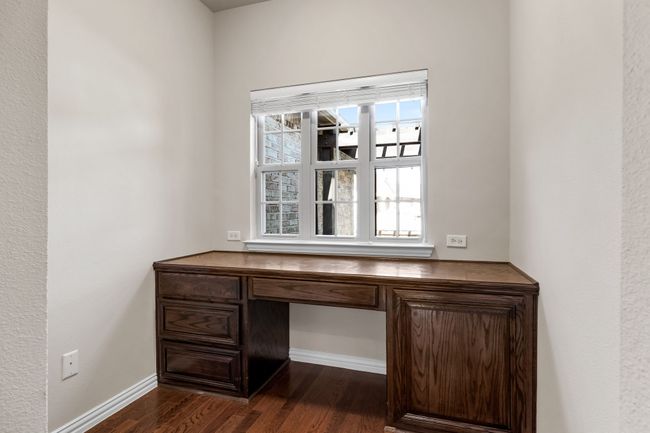 Don’t miss the additional flex space which overlooks the quaint covered patio | Image 20