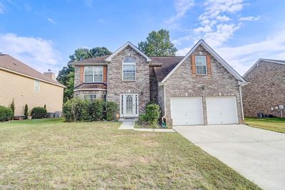 6386 Celtic Drive Sw, House other with 4 bedrooms, 2 bathrooms and 2 parking in Fulton GA | Image 3