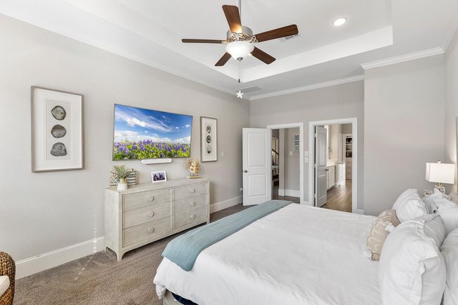 A seamless view into the elegant ensuite, offering comfort and style right off the primary bedroom. | Image 23