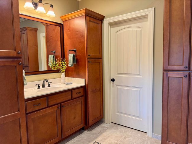 Bathroom featuring vanity and storage towers | Image 21