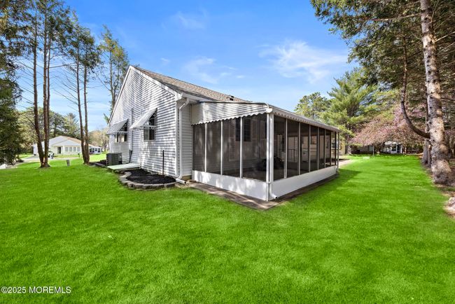 Enjoy outdoor meals or your morning cup of coffee in the patio | Image 25