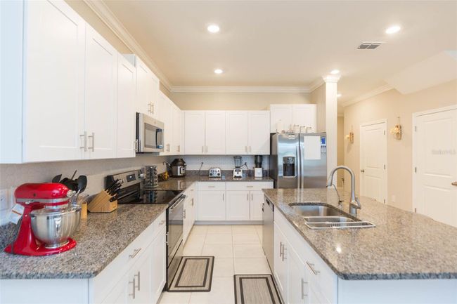 31915 Blue Passing Loop, Townhouse with 3 bedrooms, 2 bathrooms and null parking in Wesley Chapel FL | Image 12