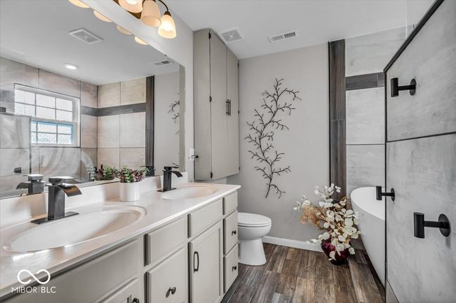 Beautifully updated primary bathroom suite fit for a king and/or queen! | Image 18
