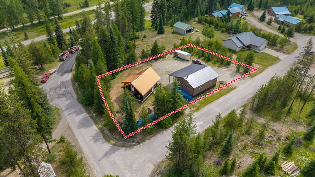 Aerial overview of property's location with property parcel outlined | Image 60
