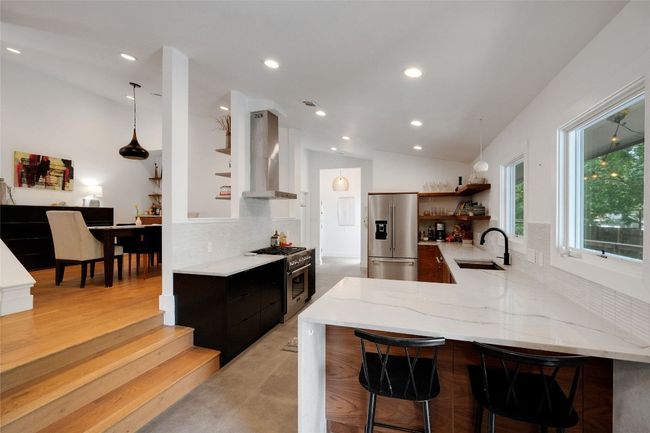 Kitchen with dining space to the left | Image 8