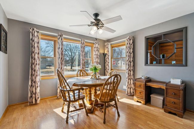 Large bright dining room (hardwood floors underneath!) | Image 11