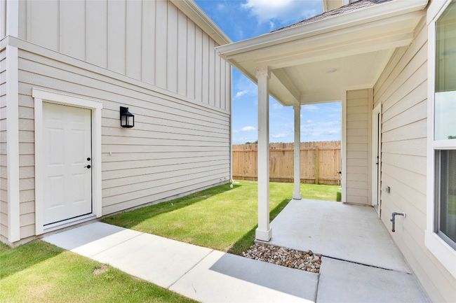 View of yard with a patio | Image 12
