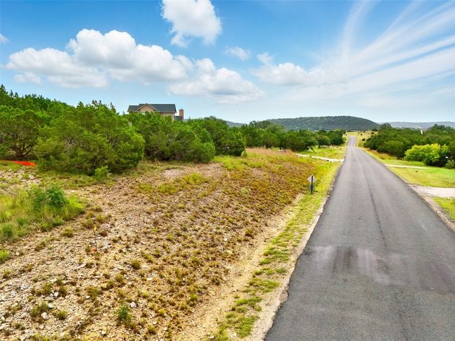 View of asphalt street with a mountain view | Image 10