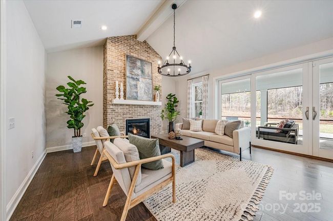 Open space with ample natural light coming through your oversized sliding doors, looking out into your private backyard | Image 10