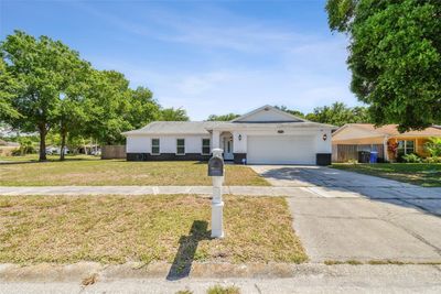 13913 Cherry Brook Lane, House other with 4 bedrooms, 2 bathrooms and null parking in Tampa FL | Image 2