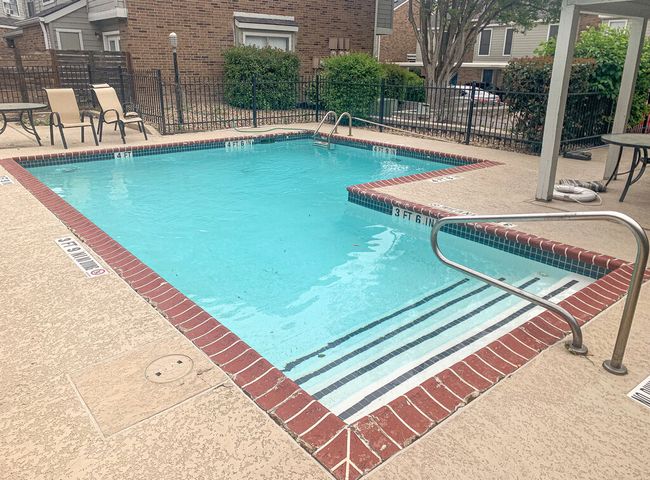 Community pool featuring a patio and fence | Image 21