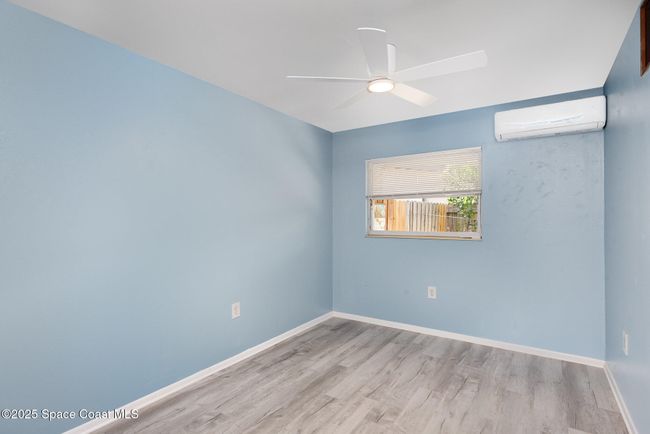 Spacious bedroom with new split unit to keep you nice and cool during the hot summer months | Image 9