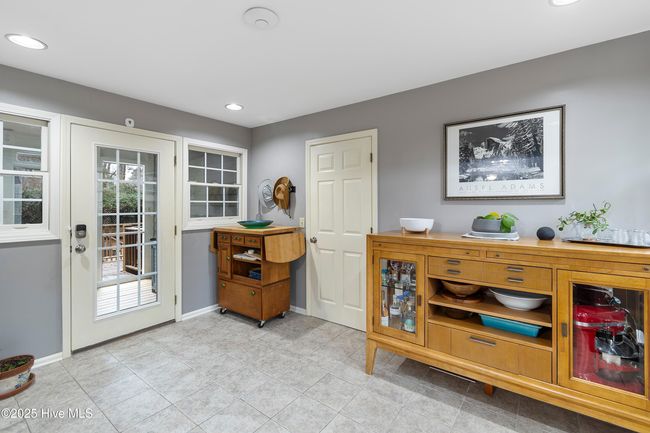Flex Space - Access Screened in Porch, Garage, Laundry, Bonus Room, Deck to Fountain! | Image 26