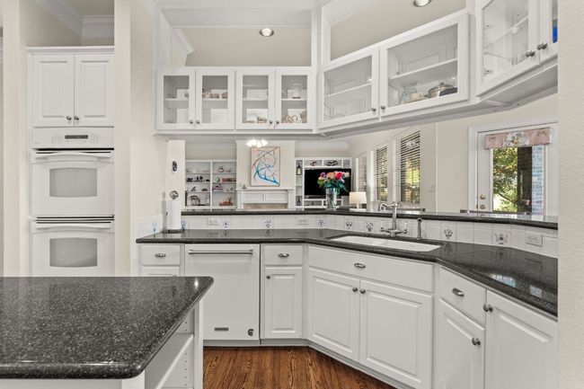 Kitchen with glass insert cabinets and great counterspace. | Image 15
