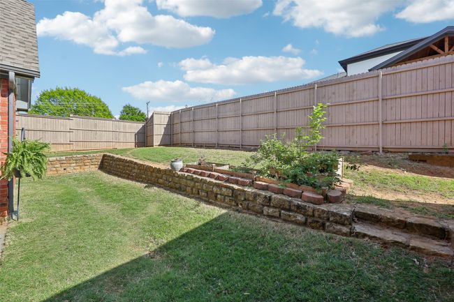 Gardening beds are established--they currently have thornless blackberry bushes blooming. It produces enough for a delicious cobbler! | Image 34