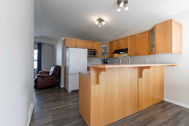 215 Heritage Court W, Home with 4 bedrooms, 2 bathrooms and 2 parking in Lethbridge AB | Image 13