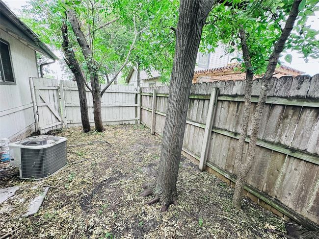 View of fenced yard | Image 15