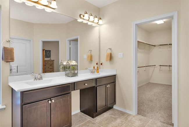 Double sinks and vanity area in primary bath. | Image 32