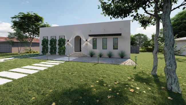 View of front of house with stucco siding and a front yard | Image 23