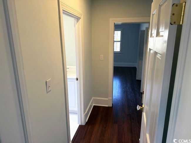 Hall featuring dark hardwood / wood-style floors | Image 20