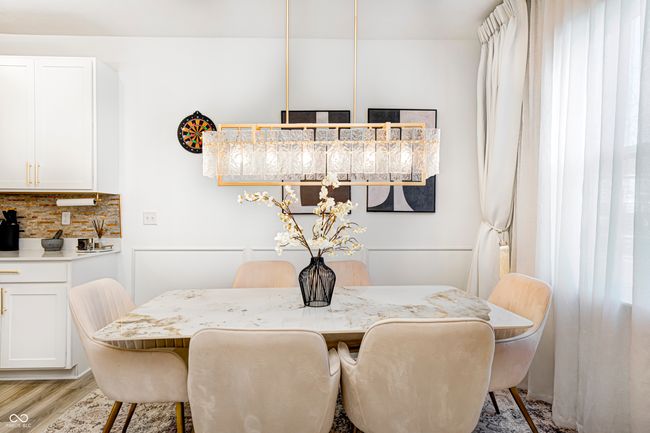 dining area featuring light wood-style floors | Image 14