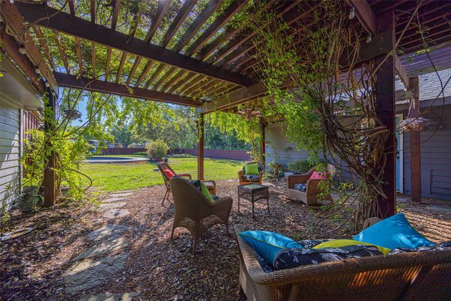 View of patio / terrace with a pergola and fence | Image 27