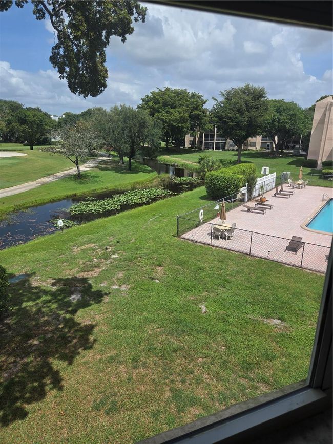 Your View From Your Windows overlooking Pool Water And Gold Course | Image 53
