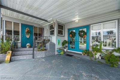 Entrance to property featuring covered porch | Image 2