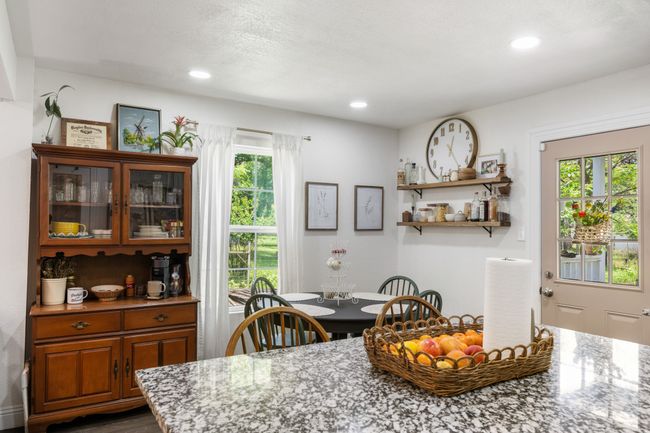 Dining space with recessed lighting | Image 10