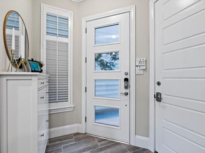 Entering the home, you are greeted by a calming neutral palette.(Photo from a previous staged listing.) | Image 2