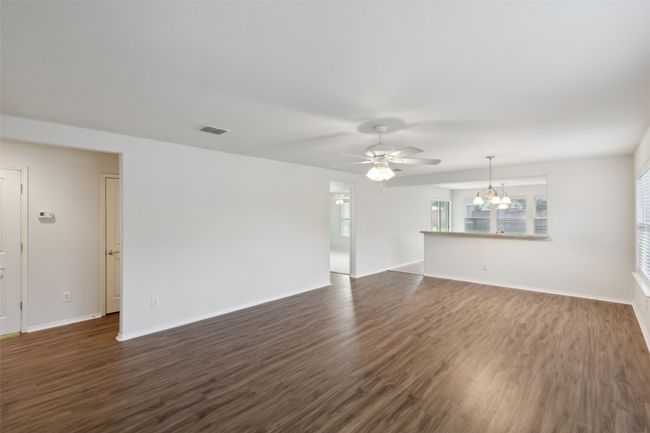 Living room with new flooring | Image 9