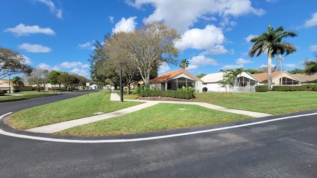 1599 Oak Berry Cir, House other with 3 bedrooms, 2 bathrooms and null parking in Wellington FL | Image 47