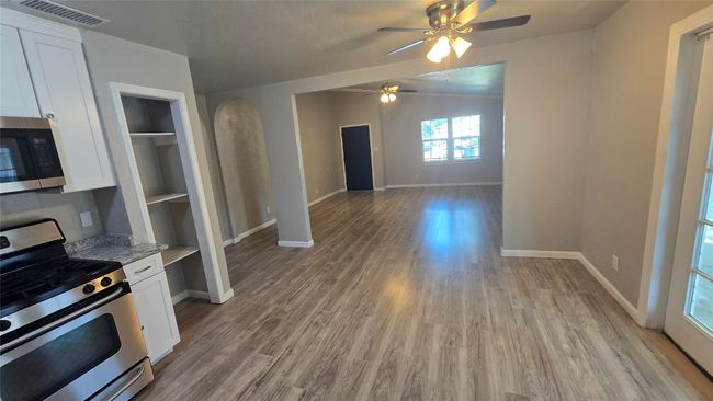 View from Kitchen in through the living room. Such a large space. | Image 7