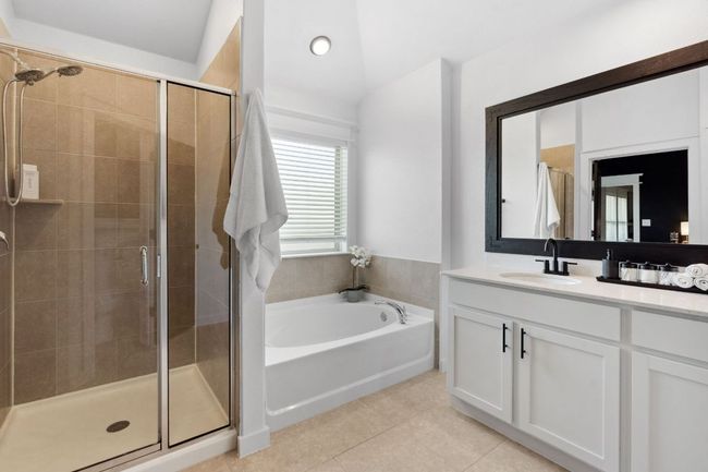 Relax in your soaking tub! The ensuite also offers a separate walk in shower. | Image 22